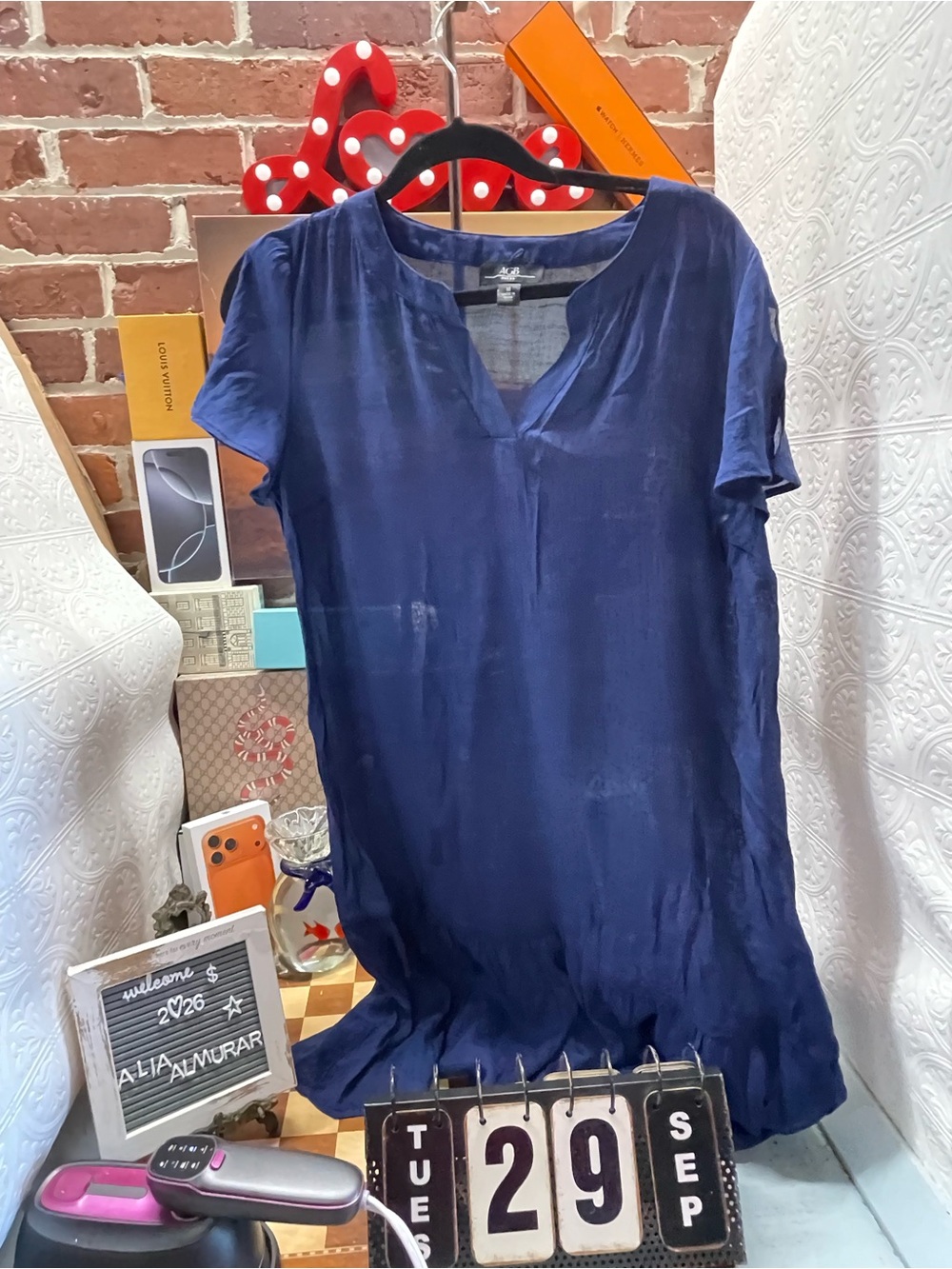 V-neck mini dress or tunic with a lightweight, semi-sheer fabric